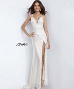 Model in Jovani 1012 cream dress with floral appliques and elegant slit