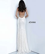 Model showing back view of Jovani 1012 white dress with open back design