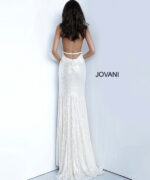 Model showing Jovani 1012 cream gown with intricate floral details from the front.