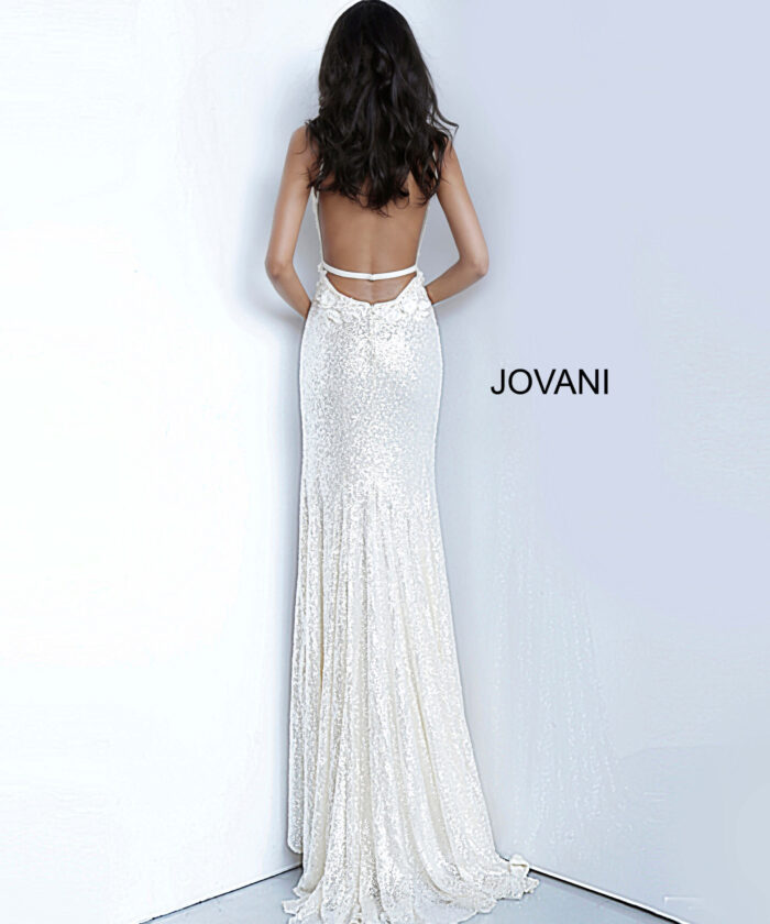 Model showing Jovani 1012 cream gown with intricate floral details from the front.