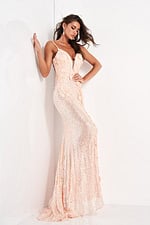 Full view of model in Jovani 1012 pink dress with floral details and high slit