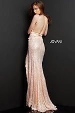 Model wearing Jovani 1012 pink dress with floral appliques and slit