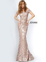 Model wearing Jovani 1122 elegant silver mermaid gown with sequins, off-the-shoulder neckline and short sleeves.