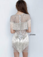 Model wearing Jovani 11999 gray mini dress, back view with fringe and sequins.