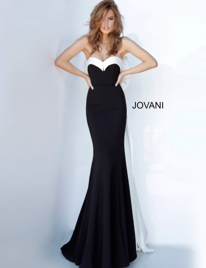 Front view of model in Jovani 12020 black gown with sweetheart neckline