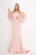 Model posing in Jovani 1226 blush mermaid silhouette dress.