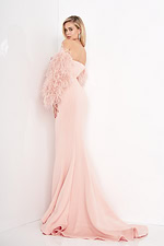 Back view of model wearing Jovani 1226 blush gown showing mermaid silhouette.