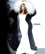 Jovani 1226 white gown with strapless design and feathered sleeves on model.
