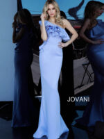 Model wearing Jovani 1307 dress in light blue, front view showcasing one-shoulder ruffle.