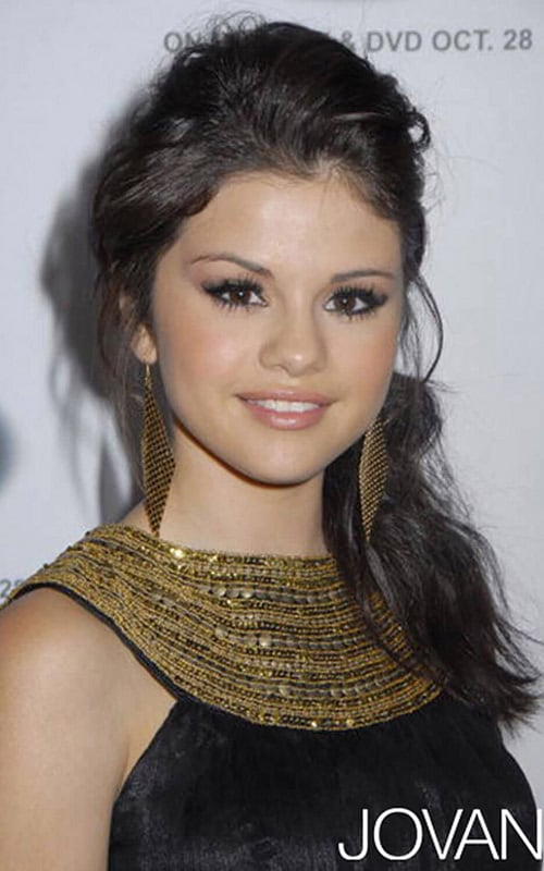Model wearing Selena Gomez Gold Dress
