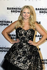 Model wearing Miranda Lambert in Jovani 159765