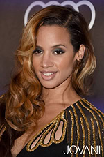 Close-up of model in Jovani 88586 showcasing neckline and gold sleeve detailing