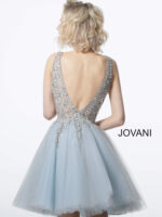 Back view of model wearing Jovani 1774 blue dress with a V-back and embellished bodice.