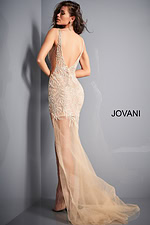 Back view of Jovani 1863 beige dress with deep V-back and elegant train.