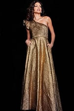 Model wearing Jovani 22268 gold gown with single ruffle strap, front view.