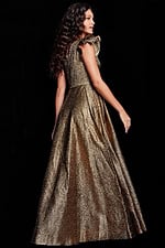 Model wearing Jovani 22268 gold gown with asymmetrical neckline, back view.