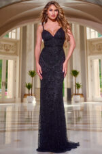 Model wearing Jovani 22286 blue gown with beadwork, V-neckline, and fitted silhouette.