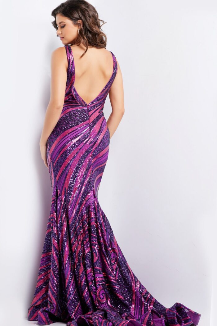 model wearing 22314 purple and fuchsia sequin gown back