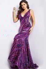 Model wearing Jovani 22314 dress with a mermaid silhouette and beaded design in purple.