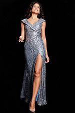 Model wearing Jovani 22336 blue gown with V-neckline and high slit from the front view.