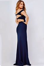 Back view of model wearing Jovani 22345 navy dress with cutout details.