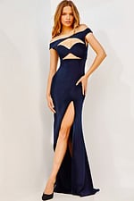 Model wearing Jovani 22345 elegant navy dress with high slit and off-the-shoulder neckline.