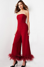Model wearing Jovani 22590 red strapless jumpsuit with wide-leg pants, front view.