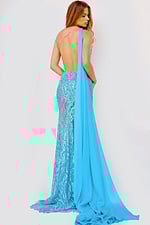 Model wearing Jovani 22602 turquoise dress showing open back and draped train, back view.