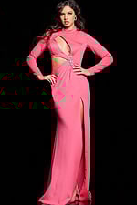 Model wearing Jovani 22606 pink gown featuring high slit and long sleeves, front view.