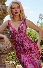 Model posing in Jovani 22770 gown with captivating pink sequins.