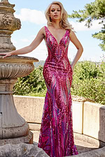 model in 22770 pink mermaid dress with sequins, posing elegantly
