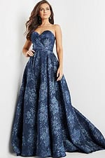Model wearing Jovani 22792 navy gown in a classic front view.
