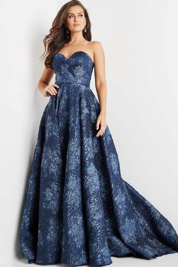 Model wearing Jovani 22792 navy gown in a classic front view.