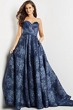 Model wearing Jovani 22792 navy gown showcasing a front view.