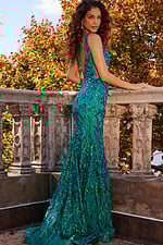 model wearing Jovani 22811 green sequin mermaid dress back view