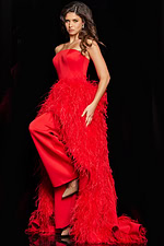 Model wearing Jovani 22817 red dress with dramatic feather detailing.