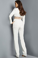 Model displaying Jovani 22818 ivory suit back view with sheer panel.