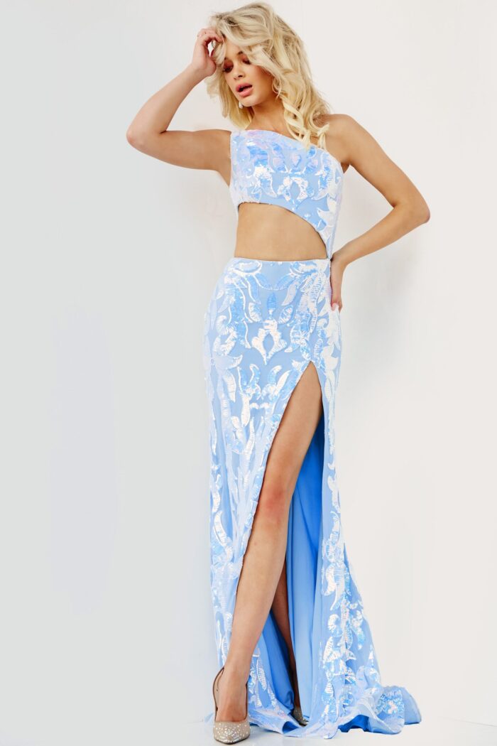 Model showcasing the Jovani 22853 blue gown's intricate lace design and one-shoulder cut.