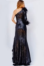 Back view of model in Jovani 22895, highlighting the black sequin gown with feathers.