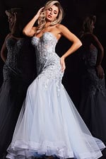 Model wearing Jovani 22924 blue mermaid gown, front view with embellishments