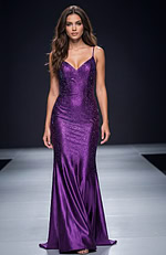 Fitted sequin gown with thin straps, sweetheart neckline, and a smooth floor length silhouette that creates a sleek, modern look