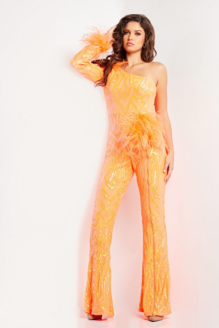 Model wearing Jovani 23026 orange jumpsuit, front view with feather details.