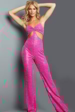 Model wearing Jovani 23069 pink sequined jumpsuit with alternate front pose.