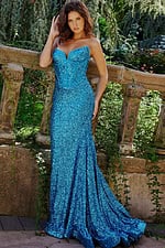 Model wearing 23077 blue sequin gown, front view