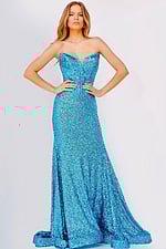 Model wearing 23077 blue sequin gown, full length front view