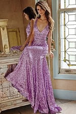 Model in Jovani 23079 lilac sequin gown with V-neck