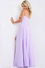 back view of model wearing 23150 lilac dress showcasing the elegant silhouette