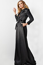 model showcasing Jovani 23179 black gown, side view with elegant design