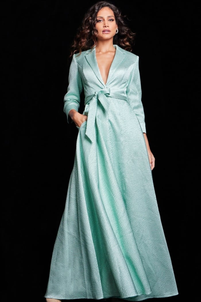 model in Jovani 23179 mint green dress with A-line silhouette and textured fabric