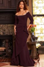 model showcasing Jovani 23190 purple dress with side view of off-shoulder neckline